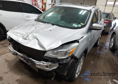 2016 Ford Escape Titanium z USA, uszkodzony, nr VIN 1FMCU9J97GUC36498